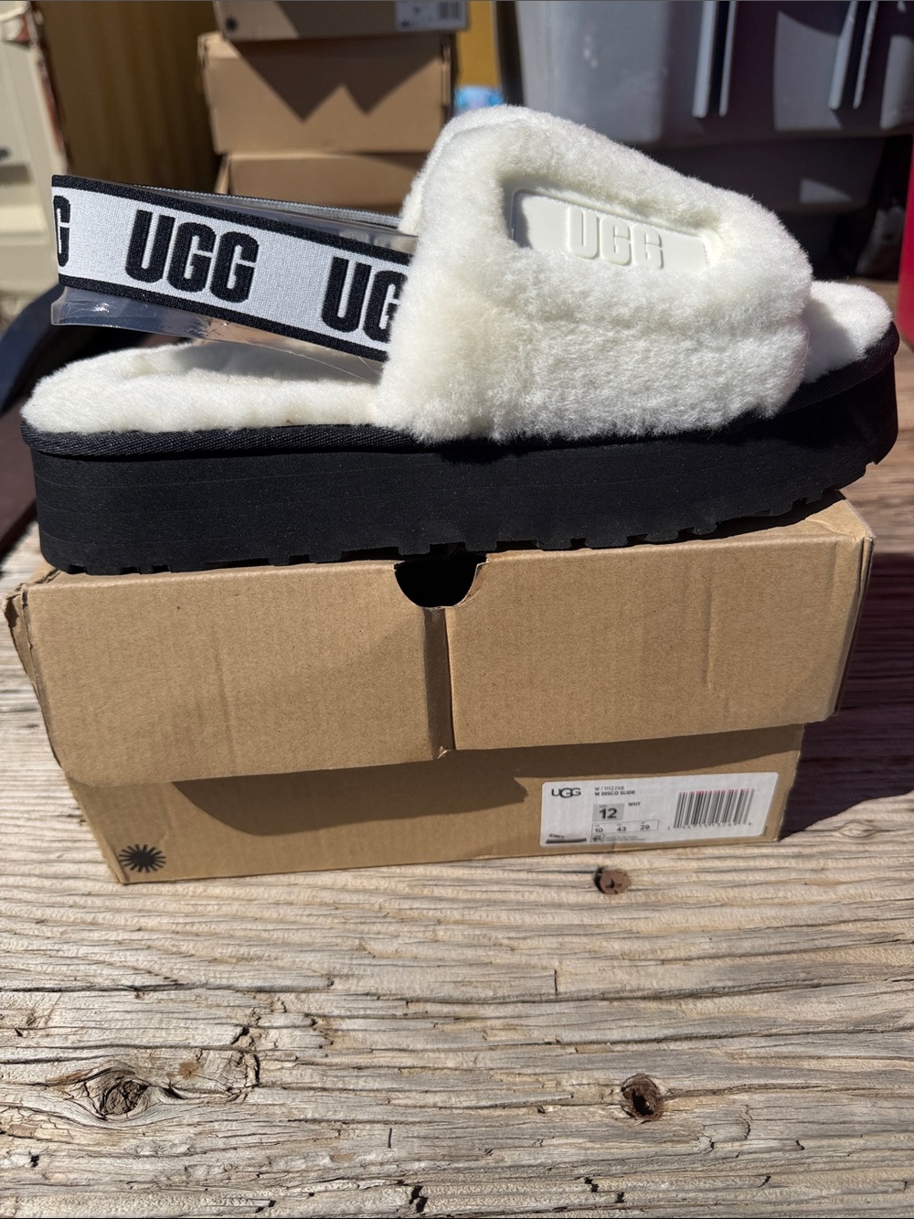 UGG White Fluff Platform Slide with Black Logo Strap